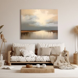 May include: A painting depicting a seascape with a golden sky and a flock of birds flying over a body of water. The water reflects the light of the sky, creating a shimmering effect.