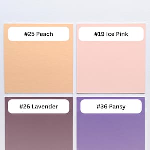 May include: A color swatch chart featuring five square samples labeled with text. The colors include #00 Cotton White, #25 Peach, #19 Ice Pink, #26 Lavender, and #36 Pansy. Each square displays its corresponding color name and number in a white label.