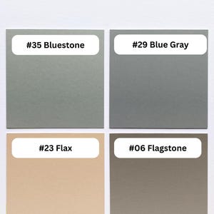 May include: A color palette display featuring five square swatches labeled with text. The colors include #00 Cotton White, #35 Bluestone, #29 Blue Gray, #23 Flax, and #06 Flagstone. Each swatch is clearly marked with its corresponding number and color name.
