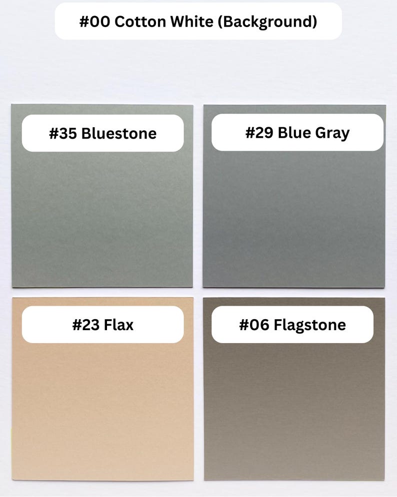 May include: A color palette display featuring five square swatches labeled with text. The colors include #00 Cotton White, #35 Bluestone, #29 Blue Gray, #23 Flax, and #06 Flagstone. Each swatch is clearly marked with its corresponding number and color name.