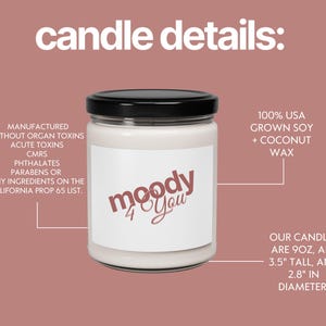 May include: A white candle in a glass jar with a black lid and a label reading moody 4 you. Text details include 100% USA grown soy and coconut wax, 9oz weight, 3.5 inches tall, 2.8 inches in diameter, and a list of excluded chemical ingredients.