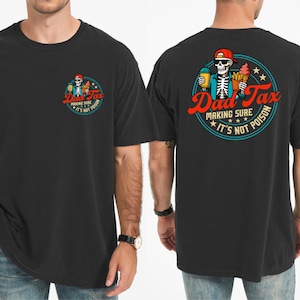 May include: A black t-shirt featuring a graphic of a skeleton wearing a red cap and sunglasses, holding a drink, fries, and ice cream. The circular design includes the text Dad Tax and Making Sure It's Not Poison in red and white lettering.