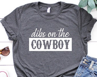 Dibs On The Cowboy, Rodeo Farm Girl Shirt, Country Girl, Cute Country Shirt,  Country Music Lover Shirt, Rodeo life shirt, Cowboy Shirt