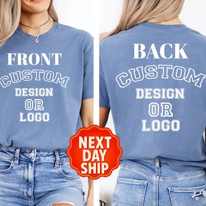 A woman wearing a blue t-shirt with the text "FRONT CUSTOM DESIGN OR LOGO" printed on it, along with distressed jeans.Front And Back Custom Shirt, Custom Tshirt, Inspired Tee, Custom Outfit, Inspired Text, Custom Text Shirts, Front and Back Personalized Tee