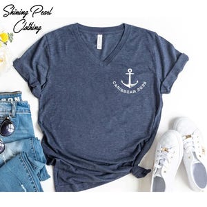 a women's v - neck shirt with an anchor on it
