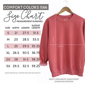 a size chart for a crew neck sweatshirt, with measurements in inches and a corresponding image of the sweatshirt.