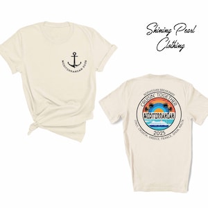 a white shirt with a picture of an anchor on it
