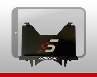 May include: A black metal tablet mount featuring the white text SIMAGIC on the bottom ledge. The center of the mount displays a graphic with a red checkered pattern next to a large white number 5. The mount has a cutout top edge and hooks.