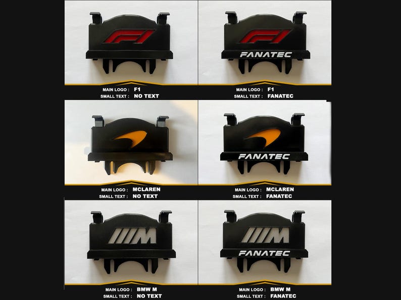 Op de afbeelding: Een collectie van zes zwarte rechthoekige displaycovers voor stuurwielen met diverse logo's zoals F1, McLaren en BMW M. Sommige versies bevatten de witte tekst FANATEC aan de onderkant, terwijl andere geen extra tekst onder het hoofdlogo hebben.