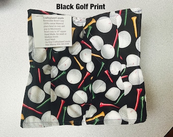 May include: Black reversible bowl cosy with a golf ball and tee print. The cosy is made of 100% cotton and is microwave safe. It is hand made and measures 10 inches square. Hand wash.