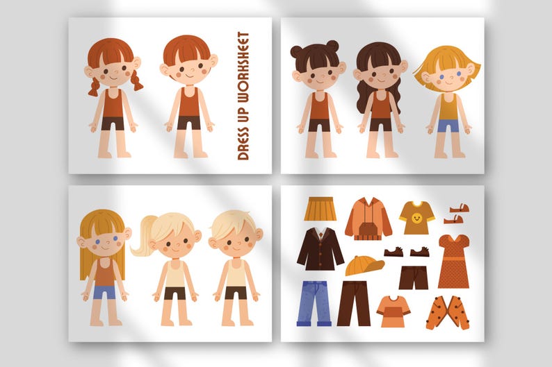 May include: Four illustrated cards featuring paper dolls and clothing. The dolls have various hairstyles and skin tones. The clothing includes skirts, jackets, shirts, pants, shoes, and a dress. The text "DRESS UP WORKSHEET" is printed on the cards.