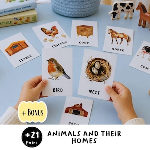 May include: A set of educational flashcards featuring watercolor illustrations of animals and their homes, including labels like Bird, Nest, Chicken, Coop, Horse, Stable, and Cow. The cards display text and images on a white background, designed for learning.