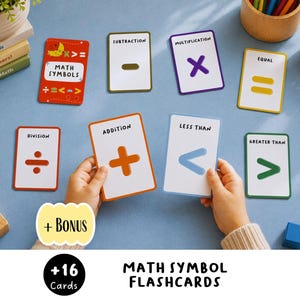May include: A set of 16 educational math symbol flashcards featuring white cards with colorful borders and symbols for addition, subtraction, multiplication, division, equal, less than, and greater than, plus a bonus card labeled Math Symbols.