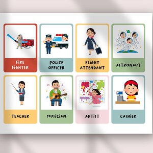 Op de afbeelding: Een rechthoekige educatieve poster met acht kleurrijke kaarten met illustraties van beroepen. Elke kaart toont een personage en de bijbehorende tekst: Fire Fighter, Police Officer, Flight Attendant, Astronaut, Teacher, Musician, Artist en Cashier.