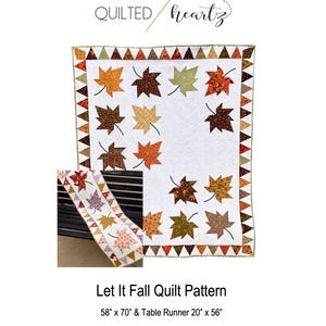 May include: A white quilt with appliqued fall leaves in shades of orange, brown, and green. The quilt is 58" x 70" with a matching table runner 20" x 56". The text "Let It Fall Quilt Pattern" is below the quilt.