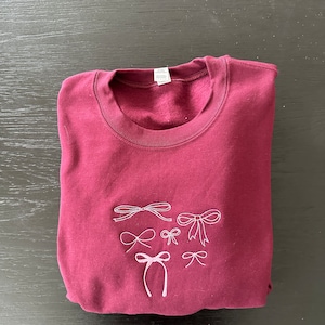 Coquette bow crewneck | Bow embroidery | Coquette shirt | Bow embroidered crewneck | Girly embroidery