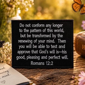 May include: A rectangular black patch featuring white embroidered text that reads: Do not conform any longer to the pattern of this world, but be transformed by the renewing of your mind. Then you will be able to test and approve that God's will is—his good, pleasing and perfect will. Romans 12:2.