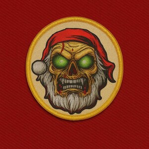 May include: Round patch featuring a zombie Santa Claus with glowing green eyes, a red Santa hat, and a white beard. The patch has a gold border and is set against a red background.