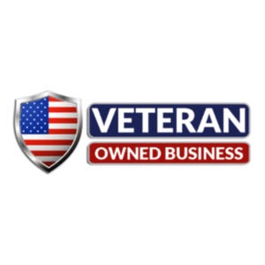 May include: A graphic logo featuring a metallic shield containing the United States flag on the left. To the right, two stacked rectangular banners display the white text VETERAN on a dark blue background and OWNED BUSINESS on a red background.