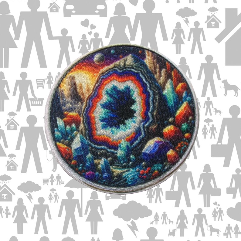 May include: A round patch featuring a detailed illustration of a geode. The geode's interior is a vibrant blue, surrounded by a ring of orange and red, with a rocky exterior. The patch has a silver border and is set against a white background.