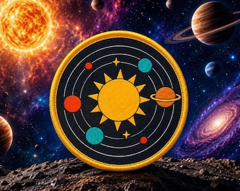 May include: A circular embroidered patch featuring a central yellow sun surrounded by concentric white orbital rings. The design includes small red and blue planets, a ringed orange planet, and yellow stars against a black background.