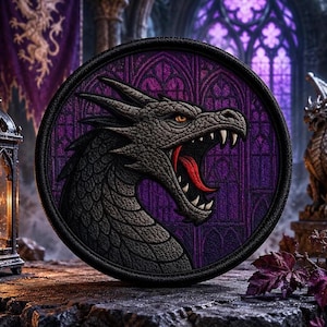 May include: A circular embroidered patch featuring a detailed grey dragon head in profile with an open mouth, sharp teeth, and a red tongue. The background of the patch is a deep purple color with a gothic arched window pattern and a black border.