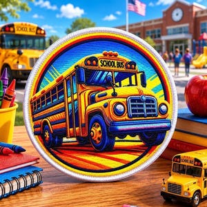 May include: A circular embroidered patch featuring a vibrant yellow school bus with the text SCHOOL BUS on the front. The design includes blue wheels, a red and orange background, and a white border, showcasing a detailed graphic of a bus.
