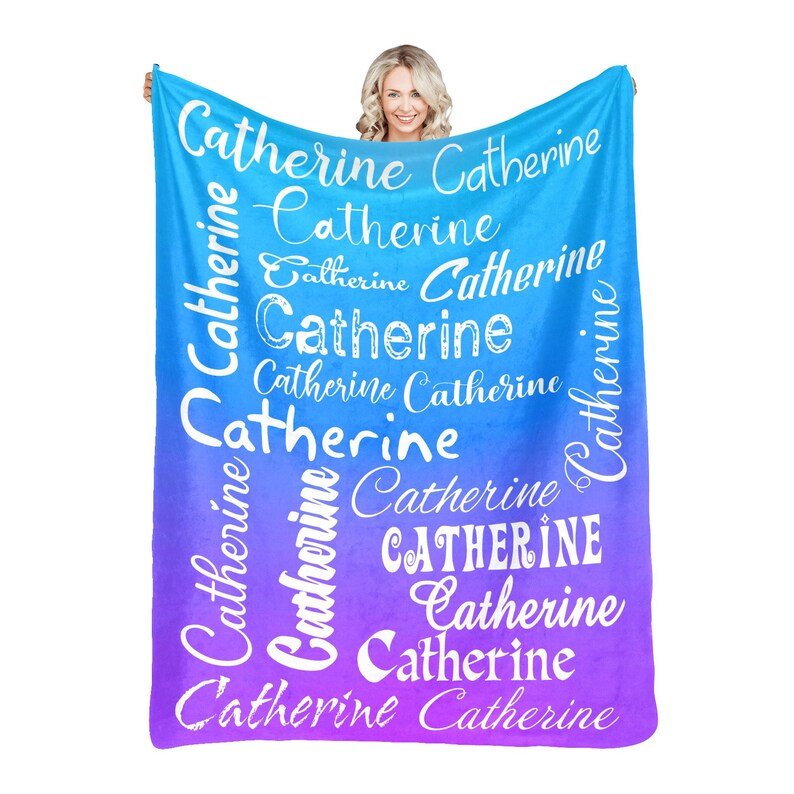 May include: A blue and purple ombre fleece blanket with the name "Catherine" repeated in white text in various sizes and styles.