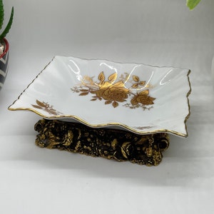 Porcelain trinket/soap dish on brass art deco base