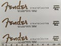 99 - Fend@r Str@tocaster headstock logo - (Waterslide decal or Self Adhesive Sticker) product logo