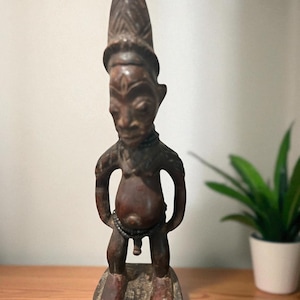 Vintage African Wooden Hand Carved Man figure with beads from Nigeria Tribal Sculpture/Antique Ibeji figure from the Yoruba culture Nigeria.