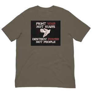 May include: A brown t-shirt with a black square graphic featuring a white dove and the text "FIGHT WAR NOT WARS DESTROY POWER NOT PEOPLE" in red.