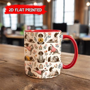 May include: A white ceramic mug with a red interior and handle. The mug is decorated with a repeating pattern of dogs in various yoga poses and floral accents. The text "2D FLAT PRINTED" is in a red banner at the top.