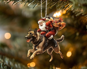 ポメラニアン犬のオーナメント、サンタの帽子とクリスマスライトの