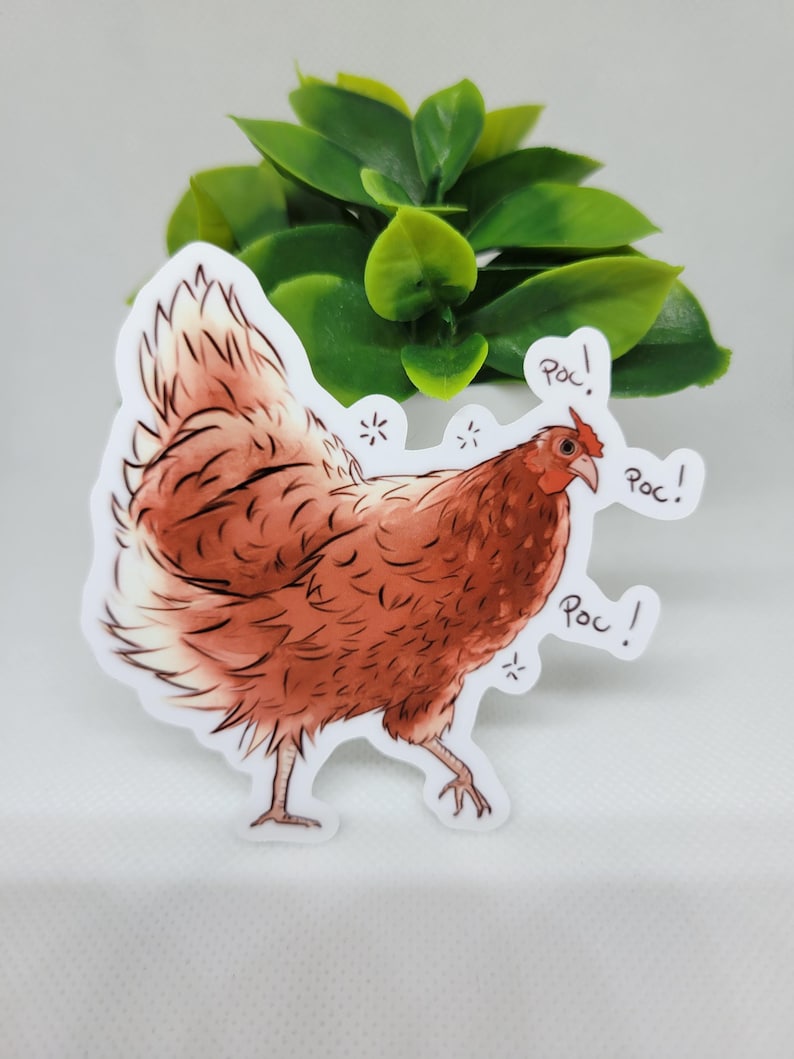 May include: A brown and white chicken sticker with the word "Poc!" written three times around it.