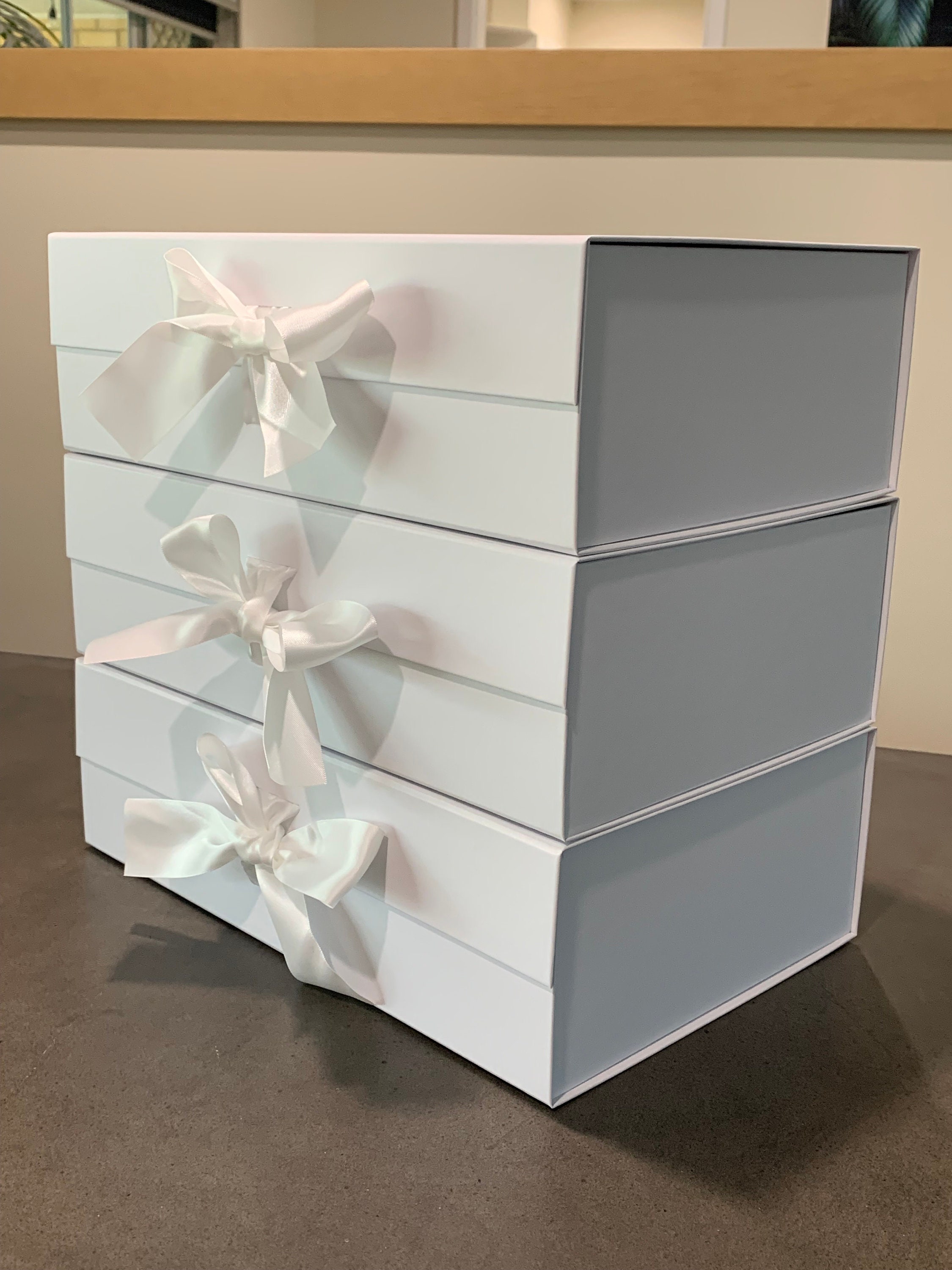 white box with ribbon tie