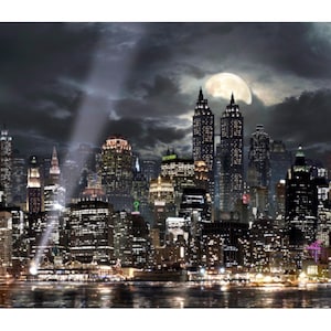 May include: A nighttime cityscape with numerous illuminated skyscrapers. A full moon is visible behind the buildings, and a spotlight shines down from the cloudy sky. The water in the foreground reflects the city lights.