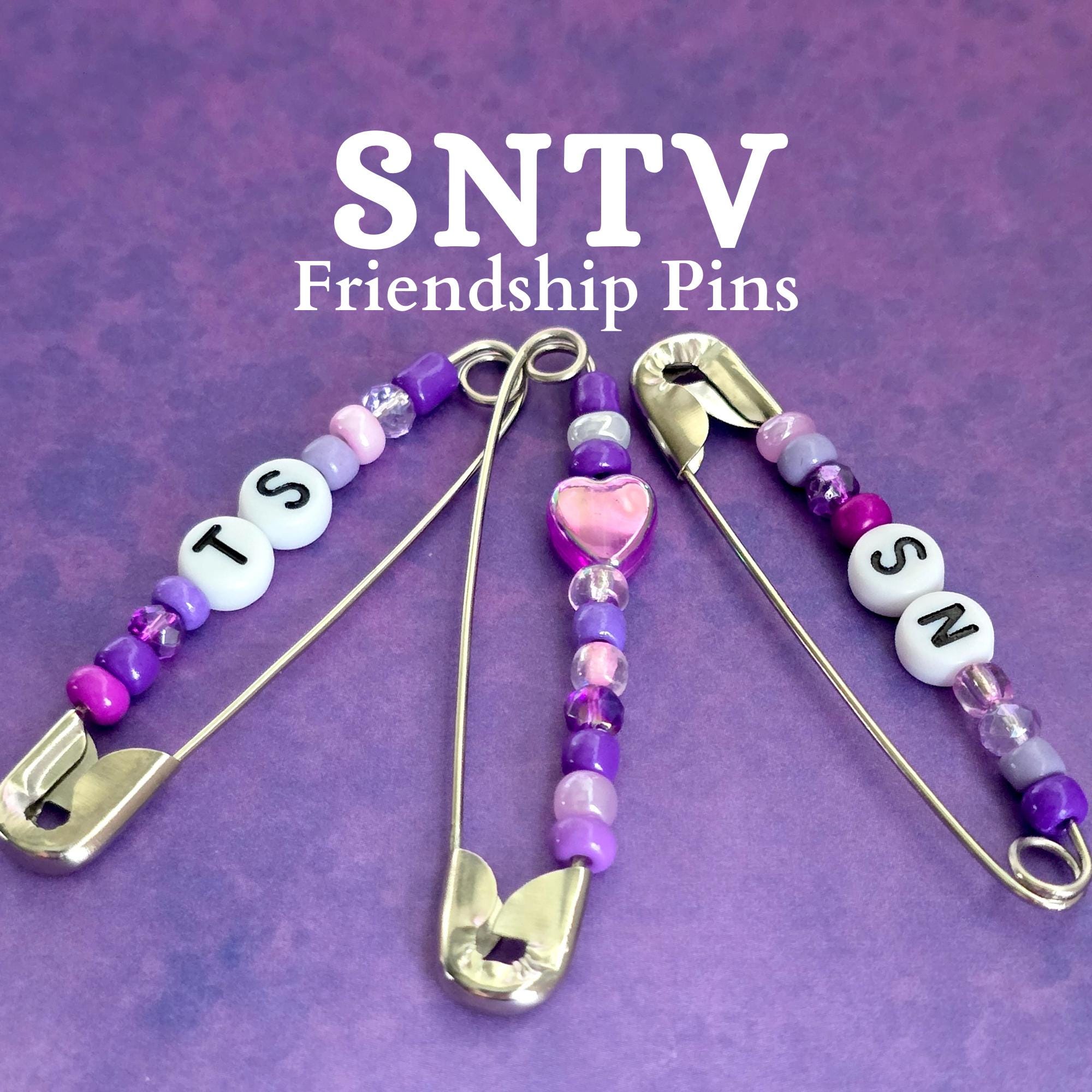 SNTV Friendship Pins | 2.2 inch Silver Pins | Colors & Designs Vary | Swifty Friendship Pin Party Favors | 80s Safety Pins Beaded Pins