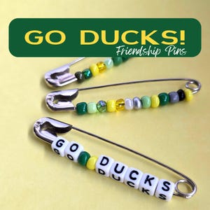 Go Ducks Retro Friendship Pins | 2.2 inch Silver Pins | Designs Vary | Oregon Friendship Pin Party Favor | Ducks 80s Safety Pins Beaded Pins
