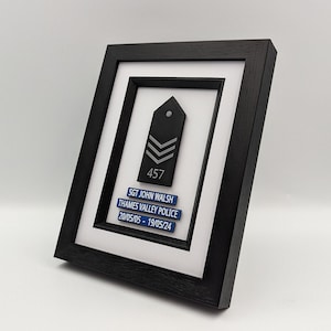 Personalised Police Presentation Glazed Inlay Frame. Black epaulette design with tank marking and shoulder number.  Personalised plaques based on thin blue line design for celebration, recruits and retirements