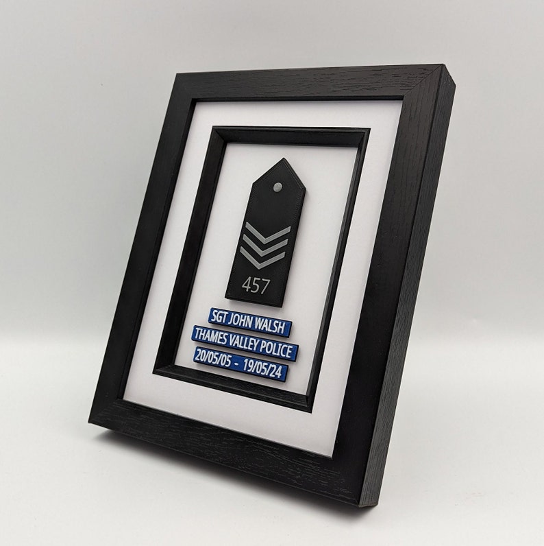 Personalised Police Presentation Glazed Inlay Frame. Black epaulette design with tank marking and shoulder number.  Personalised plaques based on thin blue line design for celebration, recruits and retirements