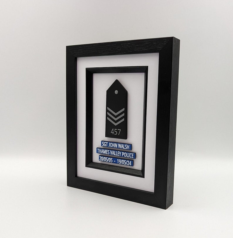 Personalised Police Presentation Glazed Inlay Frame. Black epaulette design with tank marking and shoulder number.  Personalised plaques based on thin blue line design for celebration, recruits and retirements