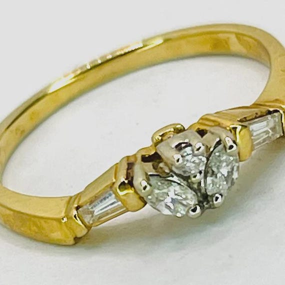 Marquise 14k yellow gold baguette brilliant marquise band ring