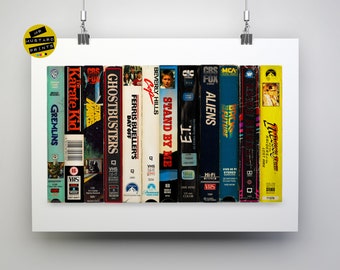 May include: A collection of 10 VHS tapes, including "Gremlins", "Karate Kid", "Star Wars", "Ghostbusters", "Ferris Bueller's Day Off", "Beverly Hills Cop", "Stand By Me", "E.T.", "Aliens", and "Back to the Future".