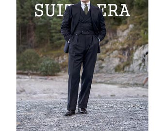 May include: A man wearing a navy blue three-piece suit with a white dress shirt and a green tie. The suit includes a double-breasted vest and pleated trousers. The text "SUIT ERA" is at the top of the image.