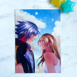 May include: A rectangular print featuring a romantic anime-style illustration of a couple gazing at each other. The background shows a blue sky with clouds. The man has blue and silver hair, and the woman has blonde hair.