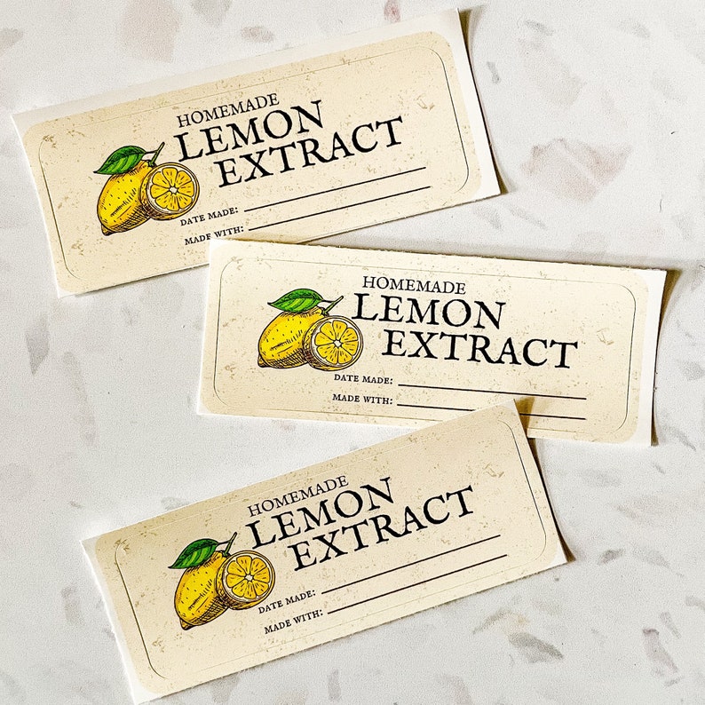 May include: Three printable labels for homemade lemon extract. Each label features a hand-drawn illustration of lemons and the text "Homemade Lemon Extract". The labels have blank spaces for the date made and what the extract was made with.