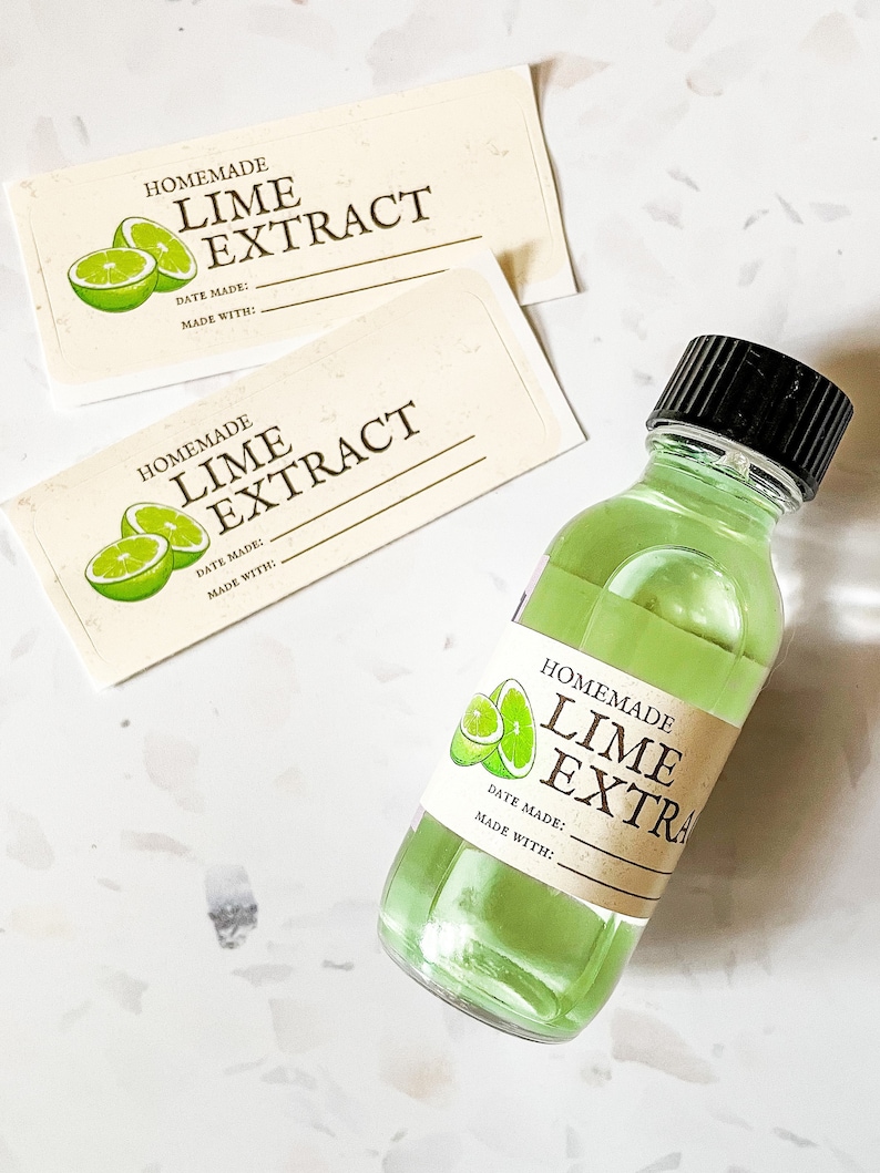 May include: Three labels for homemade lime extract. The labels are cream colored with brown text and a green lime illustration. The labels have space to write the date made and what the extract was made with. A clear glass bottle with a black lid filled with green liquid is labeled "Homemade Lime Extra".