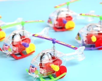 Mini helicóptero de cuerda: regalo de fiesta para niños