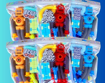 Bolsas de regalo para fiestas con artículos prellenados: juguete de robot, llavero de cohete, fidget spinner y más.